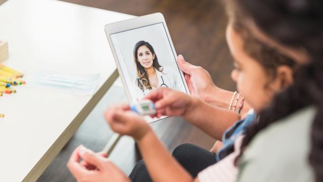 Mother and daughter have a virtual care visit